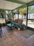 Boho Beachy getaway with large backyard nestled between downtown and the beach Hotel a South Bradenton