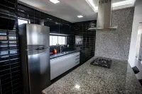 貝薩黃金公寓飯店