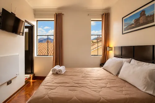 Hostal & Apartments El Triunfo - Bed and Breakfasts