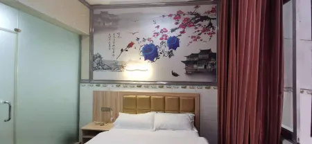 Rongjiang Xincheng Hotel (Cunchao Football Stadium Branch) Отели рядом с достопримечательностью «Baibei Miaozhai»