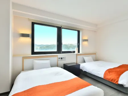 First Inn Haiki Отели рядом с достопримечательностью «Yumiharidake Observation Deck»