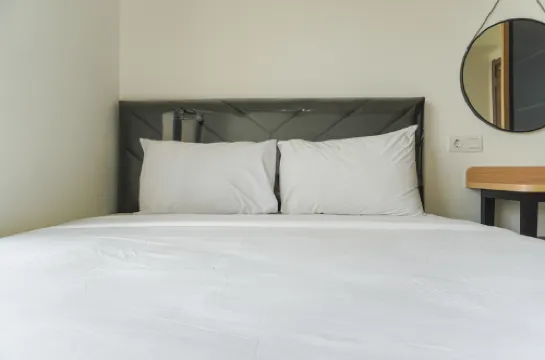 Serene and Modern 2BR Sky House BSD Apartment near AEON By Travelio