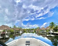 Cozy Waterfront Retreat w/ Private Boat Dock + Tiki
