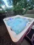 Cozy house in quiet neighborhood with hot tub, fire pit, and arcade games!