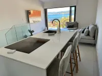 Superb new designer house with panoramic sea views