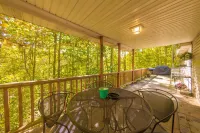Luxury & Tranquility on 8 Acres Bordering Brush Creek! Secluded 3-Level Home.