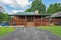 Prime location! Two king suites, hot tub and rock wall!