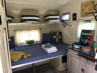 Glamping with sheep in a renovated 1972 Ace camper on 48 acres