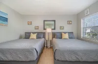 Come Enjoy the Sunshine...RIGHT ON THE BEACH! Ocean Front Condo w/ 2 Queen Beds!