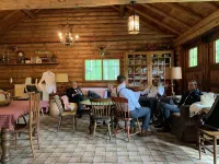 New!  Sleeps 15 Level lawn to lake.  Sandy beach.  Two docks. Great fishing.