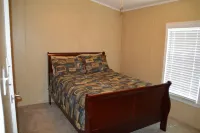Mid-lake home conveniently located in quiet neighborhood with boat ramp.