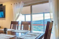 Home on the mesa’s edge the Proverbial Million Dollar View, jacuzzi and orchard