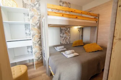 Apartments "LES PIEDS DANS L'EAU'' Hotels near Camping Le Bahamas Beach - Chadotel
