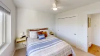 NEW Listing! NEW Build! Condo is 1-block walk to restaurants, shopping, concerts