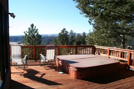 Executive Mountain Home on 70 Acres with Spectacular Views. No Cancellation Fees