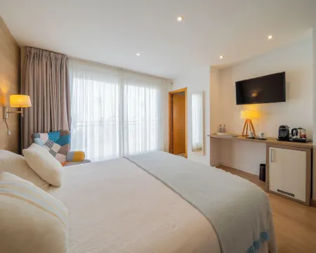 ホスタル メヌルカ シウタデリャのホテル