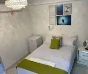 Central Area Bedroom with Common Kitchen, Living Room