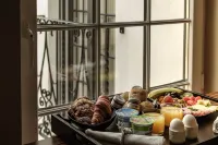 1926 le Parisot Boutique Suites - breakfast