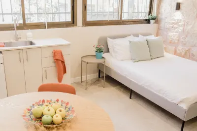 Gabriel Apartments - Stone Suits Jem City Center