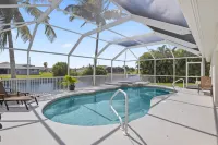 Electric Heated Pool and Spa on Freshwater Canal - Elegant Retreat Hotels in Cape Coral