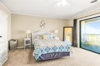 Beautiful home across from beach with pool, central AC, balcony & washer/dryer