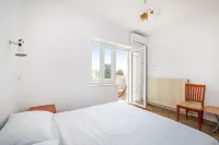 Room in Guest Room - Cozy Room Near Beach L Hotels in Novalja