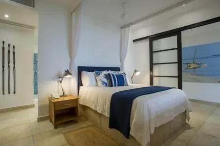 The Oyster Bay Hotel Suites Отели рядом с достопримечательностью «Коко Бич»