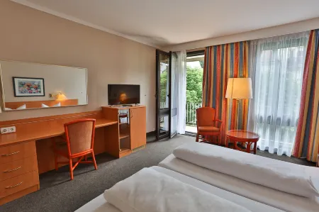 Hotel Quellenhof Отели в г. Гернсбах