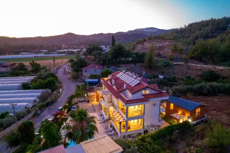 Anatolian Apartments & Bungalows Отели в г. Ciftlik Mahallesi