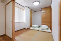 Kariyushi Condominium Resort Sea Side House Hotels in Nago