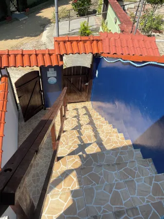 Suites Casa Azul-Vila do Abraão- Conforto, Limpeza, ótima localização Отели рядом с достопримечательностью «Лопес Мендес Бич»