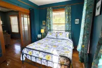 Blue house on 5th! Arcade room, fire pit, privacy fenced yard, and more!!