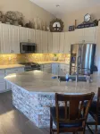 Spacious Home with incredible Pool/slide and jaquzzi.Great  River & Casino Fun.