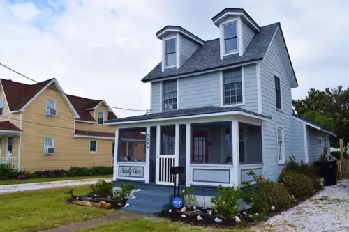 Sandy Gem- Waterfront Cottage w/ Sunset Views & Private Dock