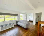 Lakeside House Tuncurry with deck overlooking the lake