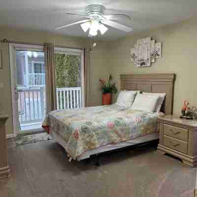 BIG 4 BEDROOM, 2 BATH BEAUTY !! ONLY 1.5 BLOCKS TO THE BEACH AND BOARDS ! Rooms