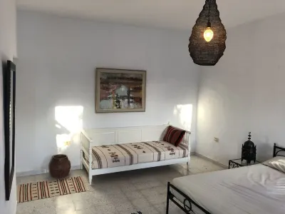 Spacious 5-suite villa with pool in Mezraya Hotels near Al Jazira Supermarché