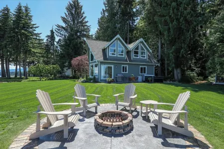 Open Design West Coast Home on 1600 Feet of Private Waterfront