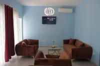 A modern 2-bedroom villa with pool and lounge area