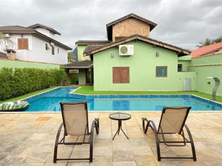 Casa com Piscina - Condomínio Morada da Praia - Bertioga Отели рядом с достопримечательностью «Foz do Rio Guaratuba»