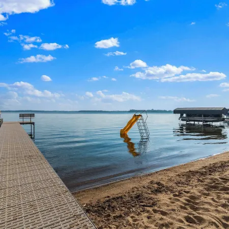 Sandy Beach Family Getaway w/ Fire Pit & Deck!