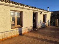 A balcony overlooking the Sierra Nevada.