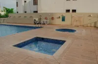 3 min to beach apartment, ocean view, terrace, big pool, and AC in Santa Marta