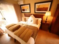Le Cozmo Guesthouse