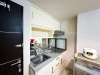 Modern Studio near Petra Christian University at The Square Surabaya Apartment By Travelio