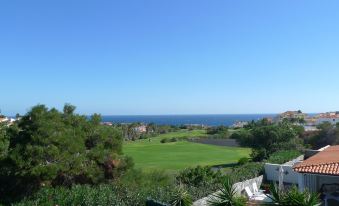 5 Bed Villa with Free WiFi, 6 Seater Hot Tub & Spectacular Sea & Golf Views.
