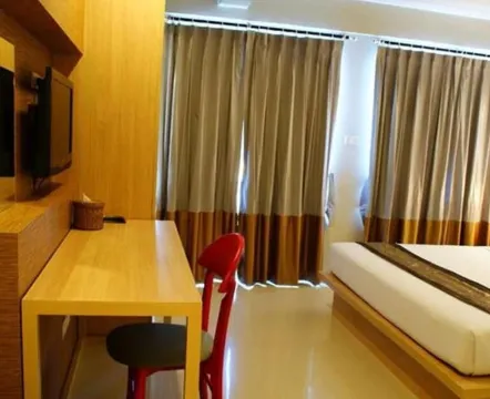 ห้องดีลักซ์ เตียงใหญ่ 1 เตียง