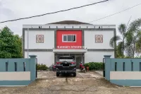 RedDoorz Syariah Near Transmart Padang Hôtels à : Lolong Belanti