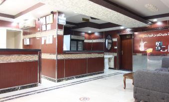 OYO 594 Taj Lamar Furnished Apartments