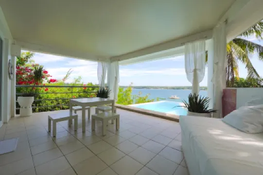 Sundowners Vacation Villas Bolinao Отели в г. 